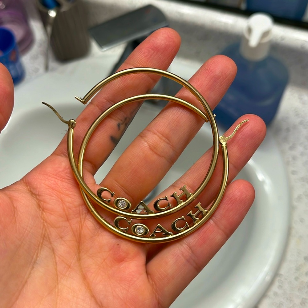 Gold plated COACH hoops with diamond accent